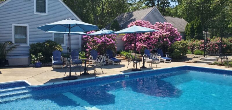 Unwind by the pool at our top-rated Cape Cod Bed and Breakfast