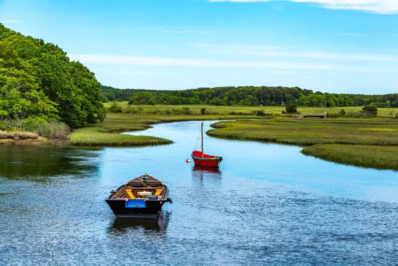 Two boats on the Herring Rich in Harwich, one of the best Cape Cod towns