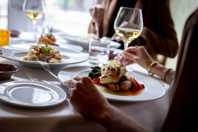 Couple enjoying seafood at one of the best restaurants in Harwich