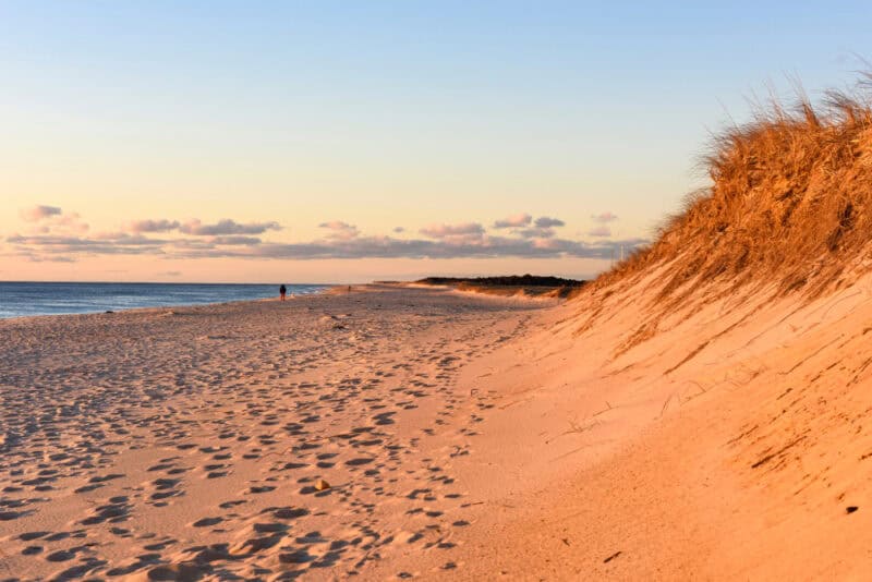 People walking on the beaches in winter - one of the best things to do on Cape Cod during your romantic Cape Cod Getaway