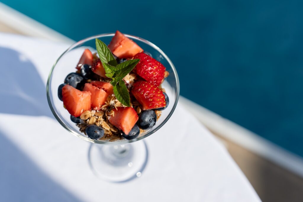 Enjoy an excellent breakfast at he best Cape Cod bed and breakfast, featuring a martini glass filled with fresh fruit.