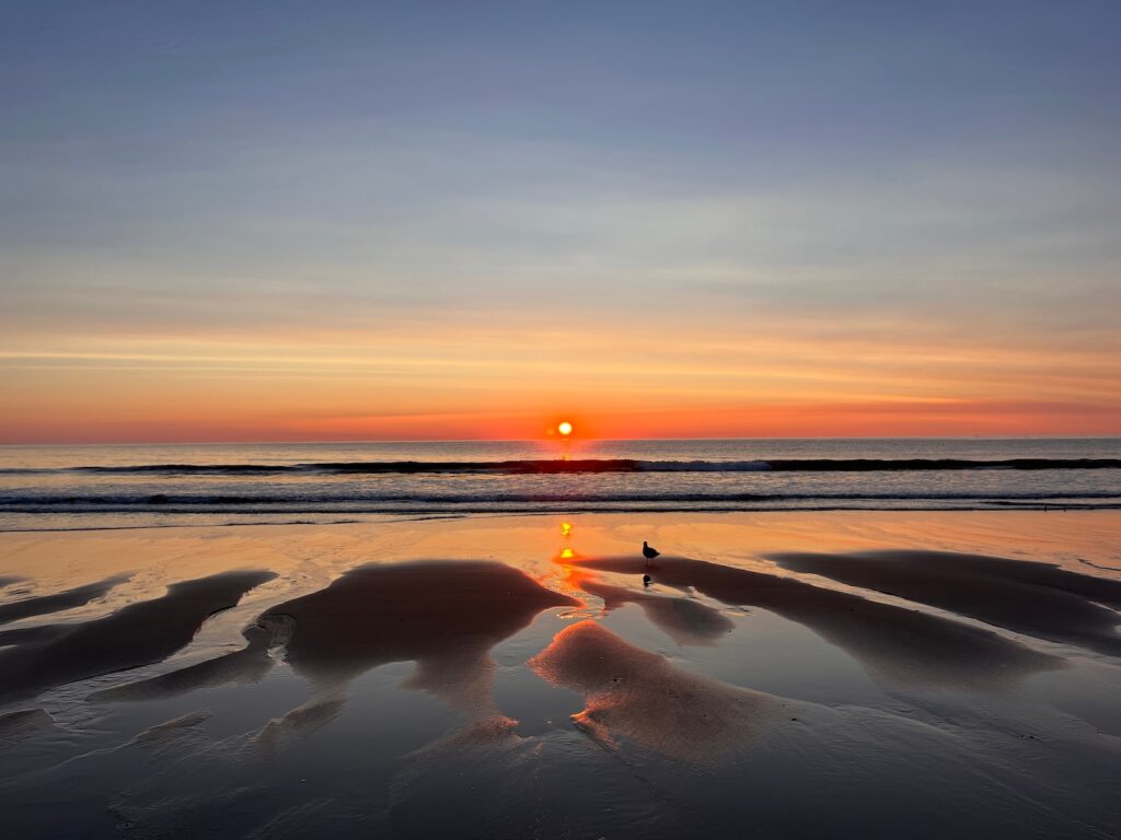 beautiful sunset on the beach, such as at Monomoy National Wildlife Refuge