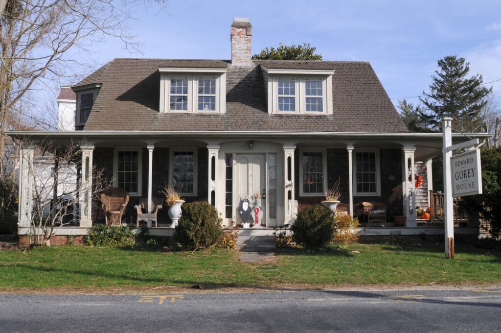A front view of the Edward Gorey House in Yarmouthport, MA, one of the unique things to do in Cape Cod in October.